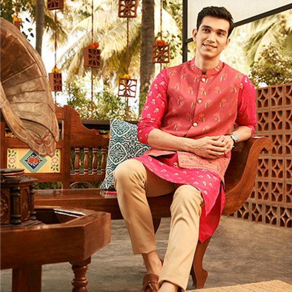 https://www.weavestyle.in/products/men-magenta-pink-golden-floral-printed-thread-work-floral-kurta-2